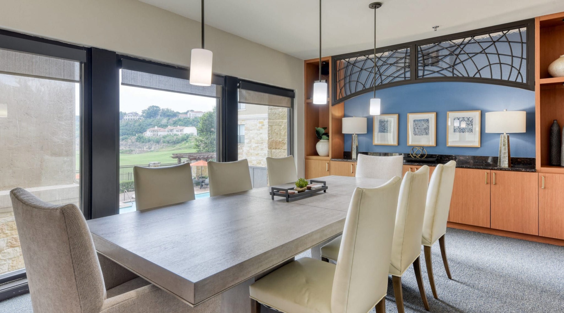 a conference room with a table and chairs